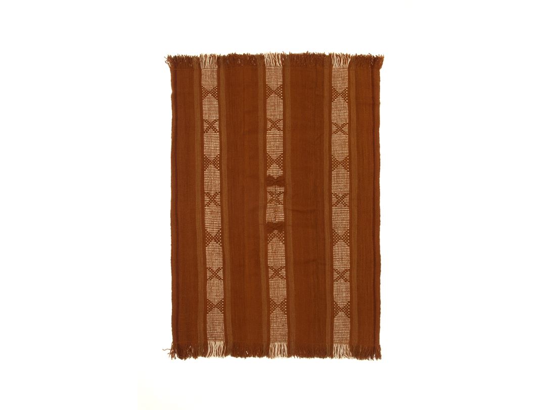 Poncho tradicional teñido vegetal