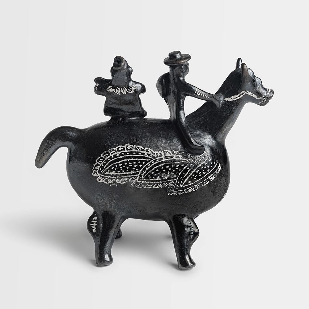 Huaso con china a caballo de cerámica de Quinchamalí