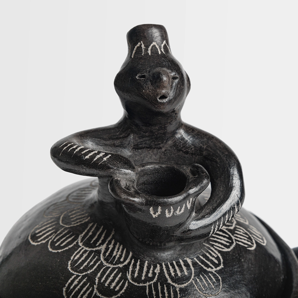 Olla guitarrera de cerámica de Quinchamalí